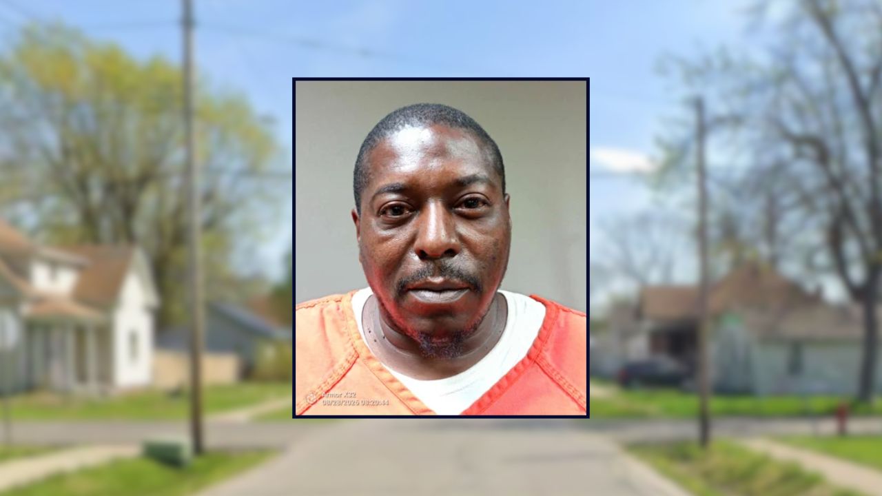 Christopher Viley appears inset against a residential street.